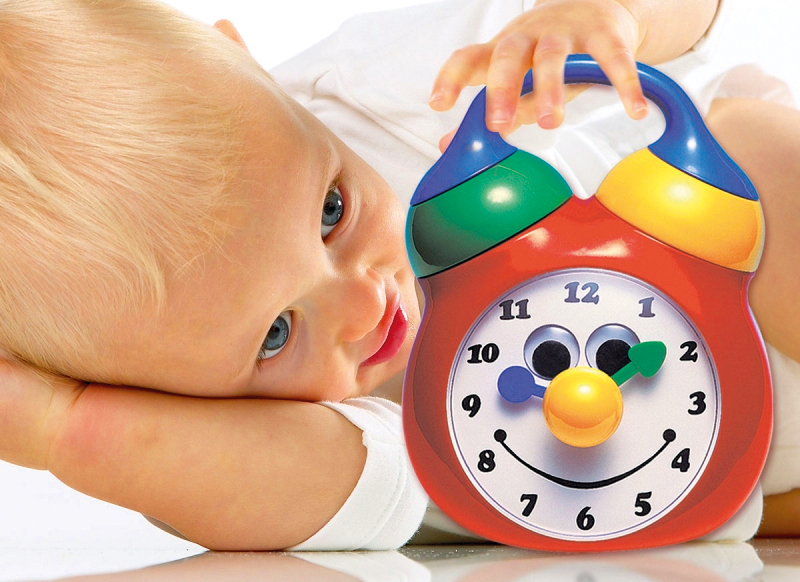 Babyspeelgoed - Tolo - klok en telefoonset