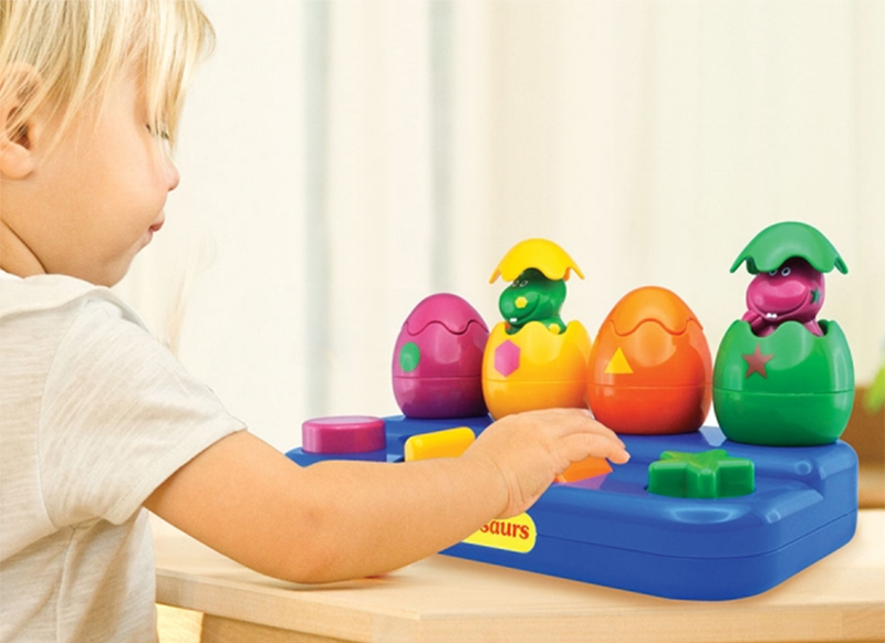 Babyspeelgoed - Tolo - pop-up dino's