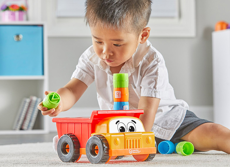 Stapelen en sorteren - Learning Resources - tony the peg stacker dump truck - 10-delig